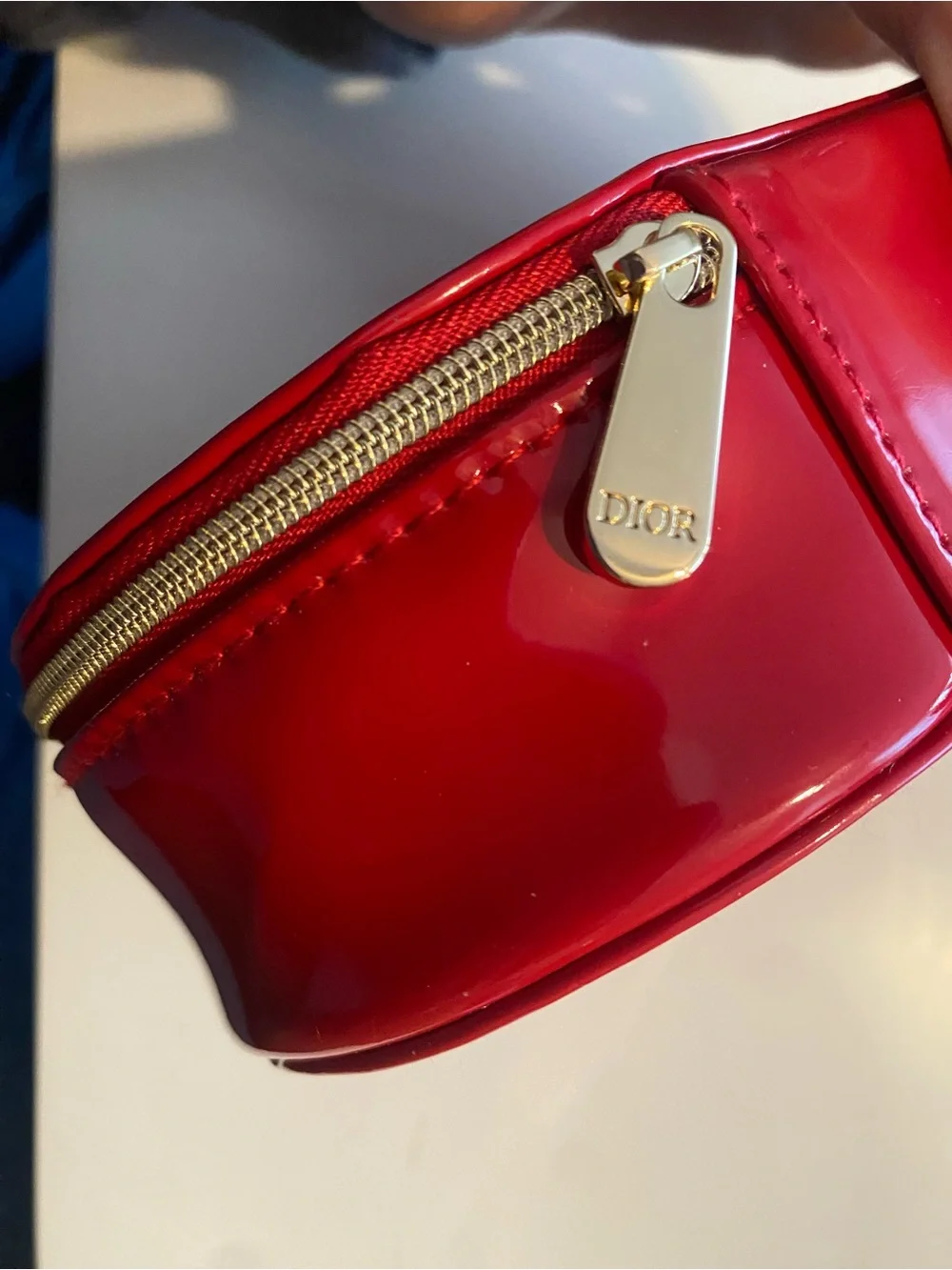 Dior Glossy Red Embossed Oval Cosmetic Case